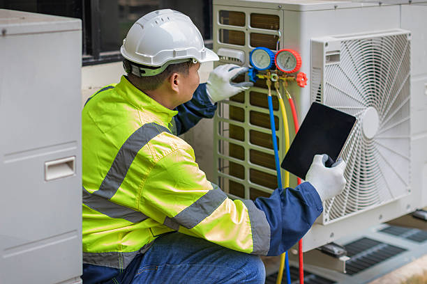 Professional Air Conditioning Repair technician working in Atlas, MI